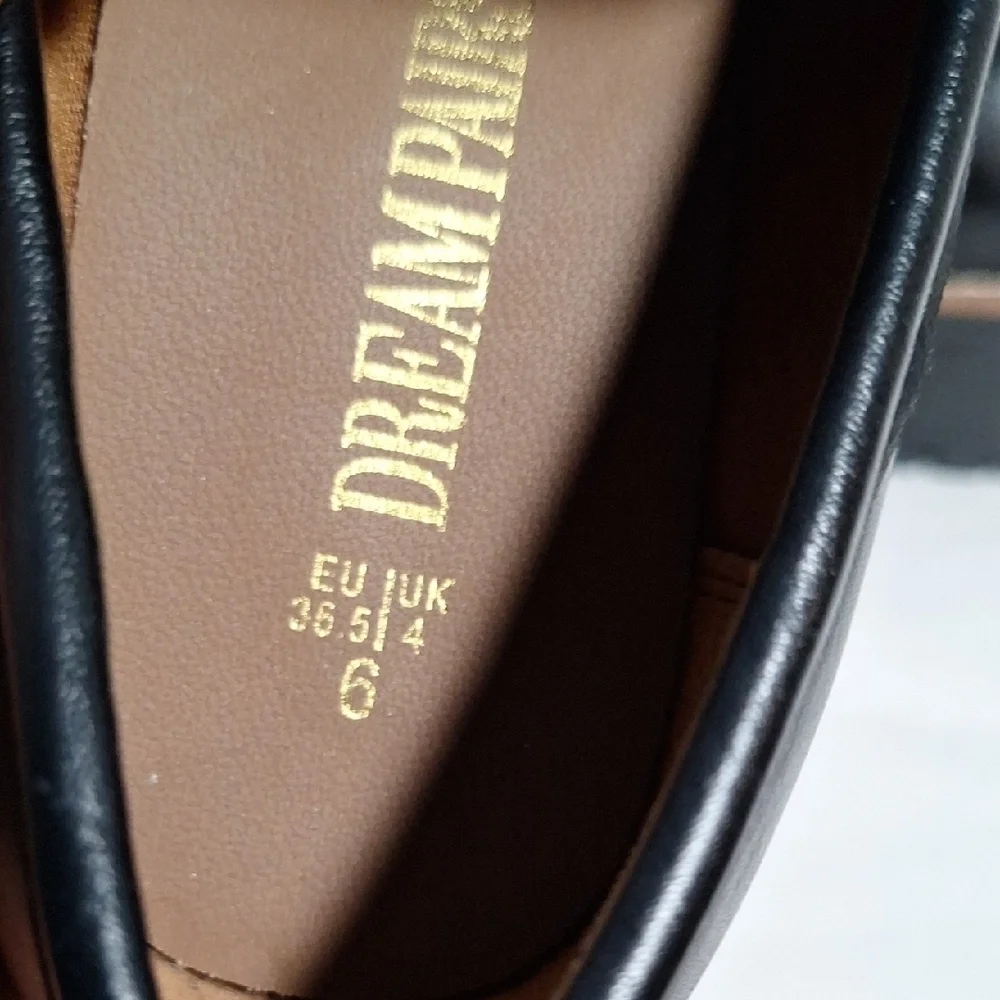 Dream Pairs Black Leather Flats with Classic Penny Design